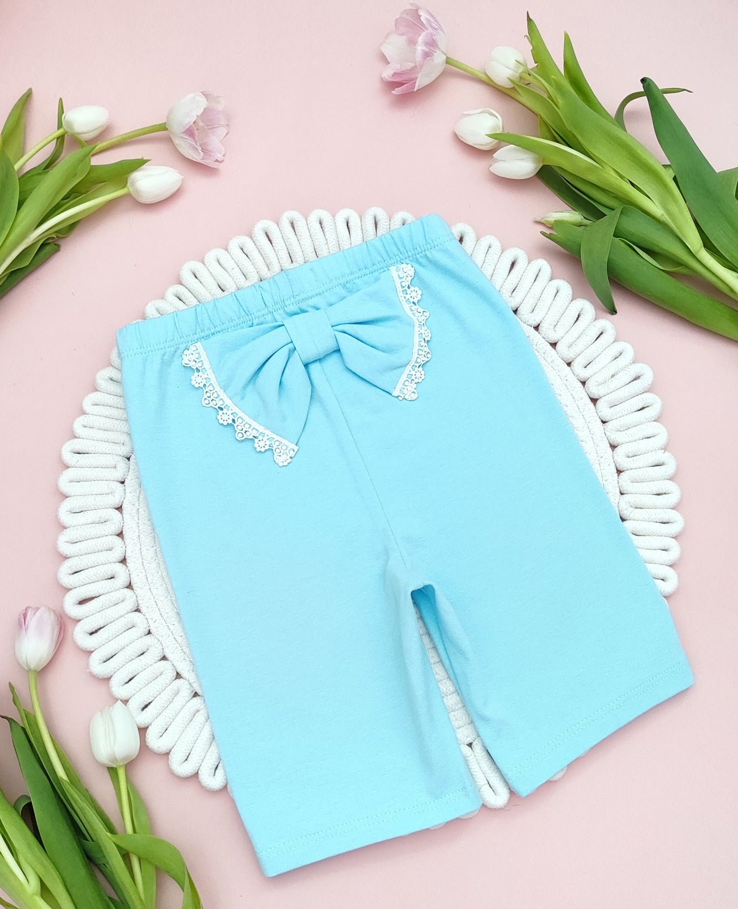 Cycling shorts with a bow