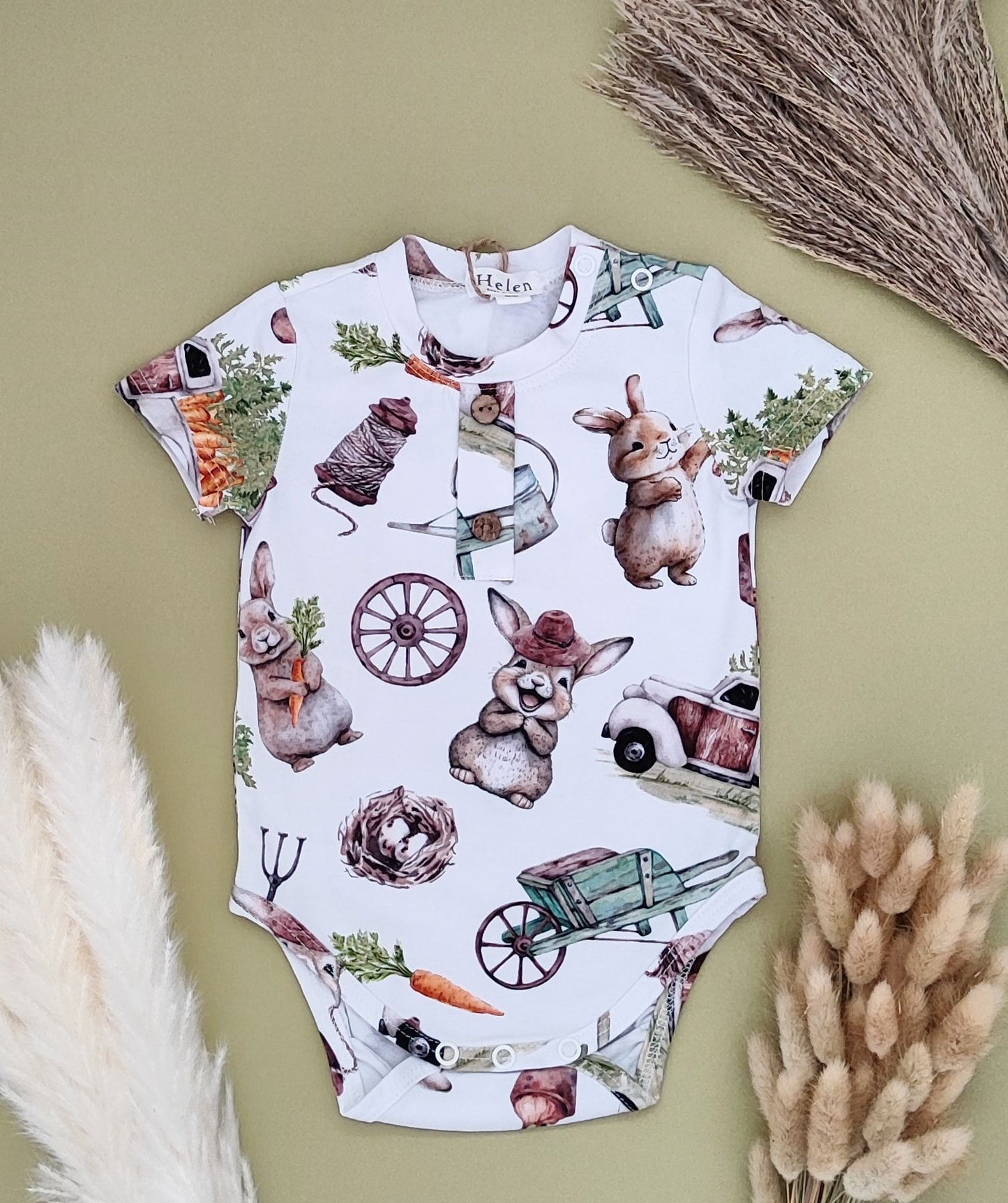 Short sleeve bodysuit with buttons